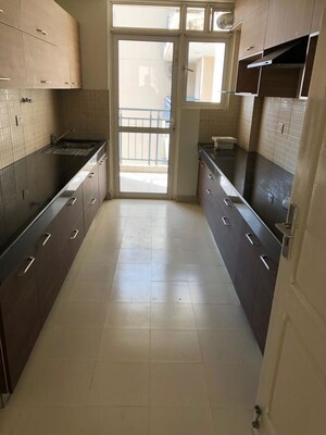 Kitchen in 3.5 BHK Apartment at Godrej Aria, Sector 79 – for Rent