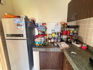 Kitchen in 2 BHK Apartment at Mahindra Aura, Sector 110a – for Rent