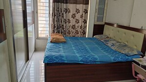 Bedroom in 2 BHK Apartment at Vanaz Corner, Kothrud – for Rent
