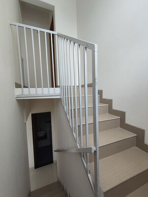 Staircase in 2 BHK Apartment at Gera Planet Of Joy, Kharadi – for Rent