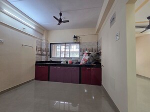 Kitchen in 1 BHK Apartment at Mhada Apartments Shastri Nagar, Goregaon West – for Sale