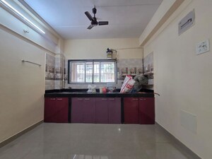 Kitchen in 1 BHK Apartment at Mhada Apartments Shastri Nagar, Goregaon West – for Sale