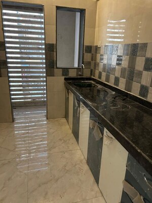 Kitchen in 2 BHK Apartment at Vijay Vilas Vega Building 1 to 6 CHS Ltd, Kavesar – for Rent