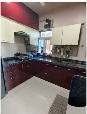Kitchen in 2 BHK Apartment at Rosa Bella, Ghodbunder Road – for Rent