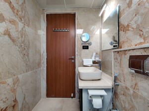 Bathroom in 4 BHK Apartment at Bhartiya Nikoo Homes Phase 2, Thanisandra Main Road – for Rent