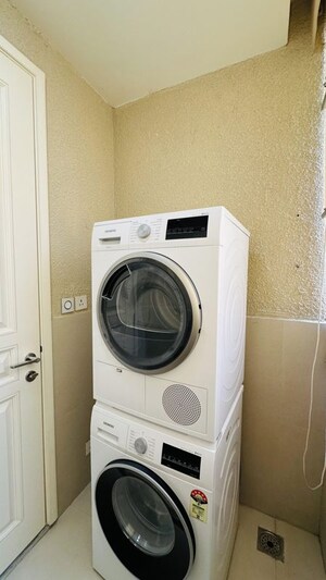 Bathroom in 2 BHK Apartment at Bhartiya Nikoo Homes Phase 2, Thanisandra Main Road – for Rent
