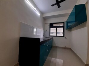 Kitchen in 2 BHK Apartment at Siddharth Nagar CHS Goregaon, Goregaon West – for Rent