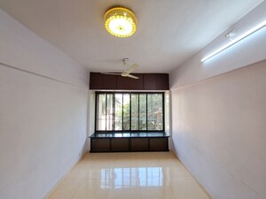 Room in 1 BHK Apartment at Vasant Gulmohar CHS, Vasant Vihar – for Sale