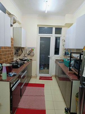 Kitchen in 3 BHK Apartment at Supertech Cape Town, Sector 74 – for Rent