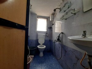 Bathroom in 2 BHK Apartment at Gokuldham Complex, Goregaon East – for Rent