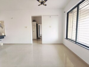 Living Room in 2 BHK Apartment at Kolte Patil Margosa Heights, Mohammadwadi – for Rent