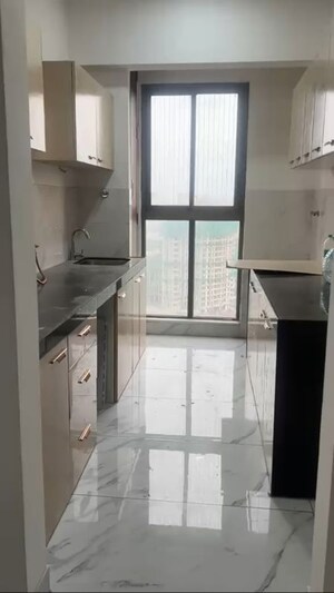 Kitchen in 2 BHK Apartment at Raymond Ten X Habitat, Pokhran Road No Two – for Rent