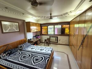 Bedroom in 1.5 BHK Apartment at New Sujata CHS, Juhu – for Rent