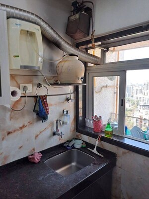 Kitchen in 2 BHK Apartment at Siddhi Highland Park, Kolshet Road – for Sale