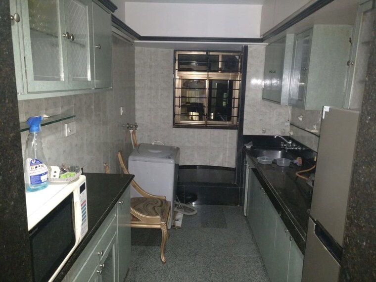 Kitchen, arshie-complex 3 Bedroom 1500 Sq.Ft. Apartment In Versova Mumbai 10606342