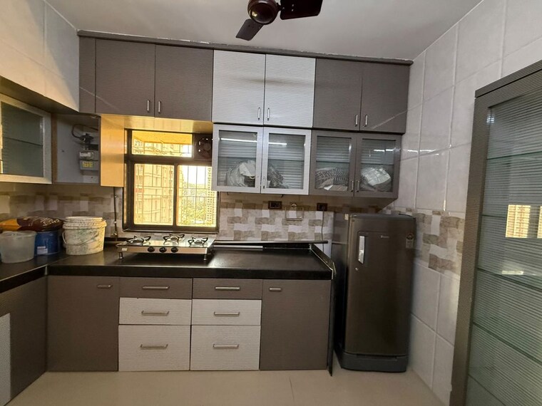 Kitchen, uma-sparta 2 Bedroom 666 Sq.Ft. Apartment In Ghodbunder Road Thane 10606421