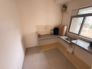 Kitchen in 1 BHK Apartment at Piramal Vaikunth, Balkum Pada – for Rent