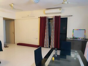 Living Room in 2 BHK Apartment at Magarpatta Sylvania, Hadapsar – for Rent