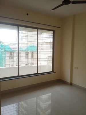 Bedroom in 2 BHK Apartment at Sadguru Complex II, Goregaon West – for Sale