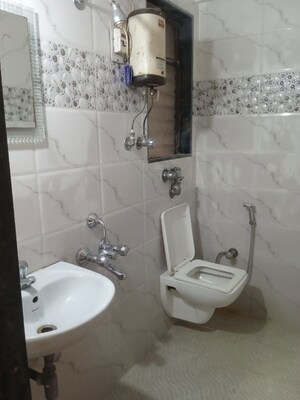 Bathroom in 2 BHK Apartment at Sadguru Complex II, Goregaon West – for Sale