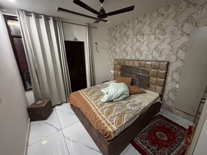 Bedroom in 3 BHK Builder Floor at Motia Blue Ridge, Dhakoli – for Rent