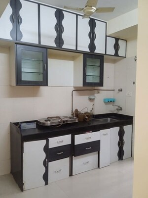 Kitchen in 2 BHK Apartment at Sadguru Complex II, Goregaon West – for Sale