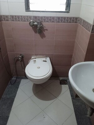 Bathroom in 2 BHK Apartment at Sadguru Complex II, Goregaon West – for Sale