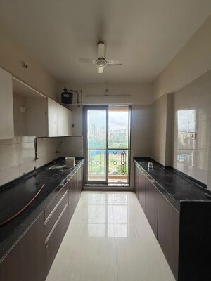 Kitchen in 2 BHK Apartment at Platinum Heritage, Ghodbunder Road – for Rent