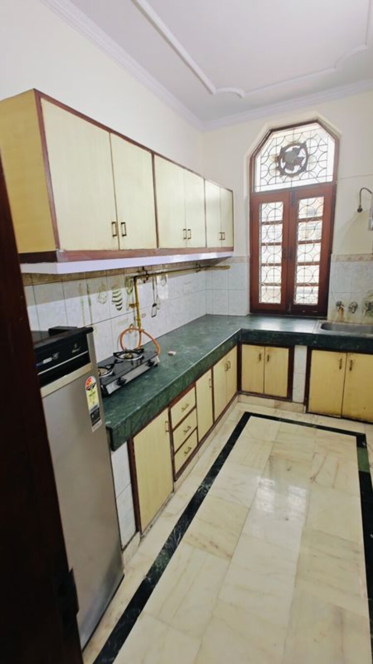 Kitchen, east of kailash 3 Bedroom 150 Sq.Yd. Builder Floor In East Of Kailash Delhi 10325064