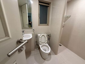 Bathroom in 2 BHK Apartment at Hiranandani Estate Carrara, Ghodbunder Road – for Sale