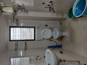 Bathroom in 2 BHK Apartment at Ahimsa Tower, Malad West – for Rent