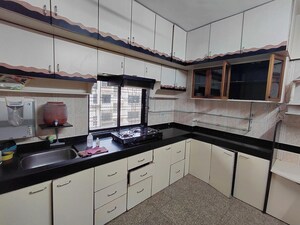 Kitchen in 2 BHK Apartment at Ahimsa Tower, Malad West – for Rent