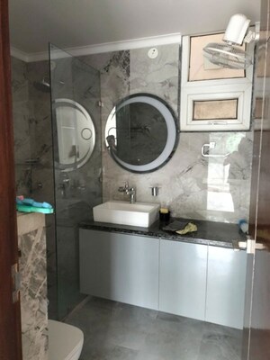 Bathroom in 3 BHK Builder Floor at Ansal Sushant Lok I, Sector 43 – for Rent