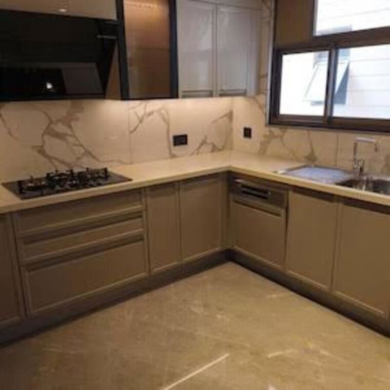 Kitchen, tarc-tripundra 3 Bedroom 2200 Sq.Ft. Apartment In Kapashera Delhi 10494683