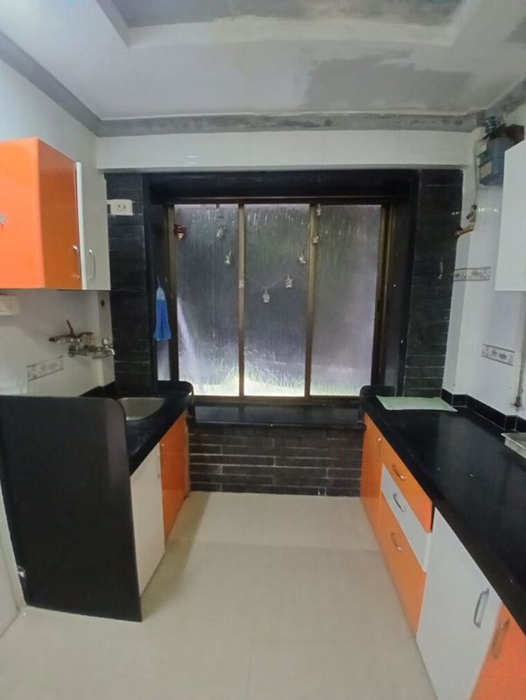 Kitchen, lotus-unity 1 Bedroom 412 Sq.Ft. Apartment In Versova Mumbai 10605732