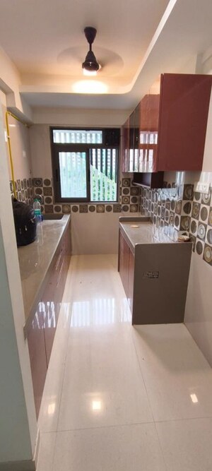 Kitchen in 2 BHK Apartment at Adityaraj Building, Tagore Nagar – for Sale