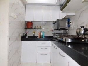Kitchen in 2 BHK Apartment at Olympia Tower, Jacob Circle – for Rent