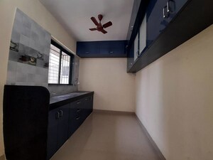 Kitchen in 2 BHK Apartment at Shiv Dham Apartment, Goregaon East – for Rent