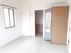 Room in 2 BHK Apartment at Kumar Samruddhi Society, Vishrantwadi – for Rent