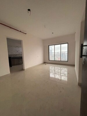 Room in 2 BHK Apartment at IM Applaud 38, Goregaon East – for Rent