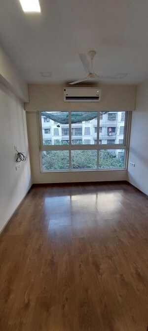 Room in 2 BHK Apartment at Group Satellite Elegance, Goregaon East – for Sale