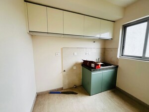 Kitchen in 2 BHK Apartment at Piramal Vaikunth Cluster 2, Balkum Pada – for Rent