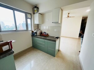 Kitchen in 2 BHK Apartment at Piramal Vaikunth Cluster 2, Balkum Pada – for Rent