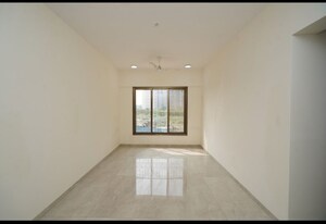 Room in 2 BHK Apartment at Abrol Signature, Malad West – for Sale