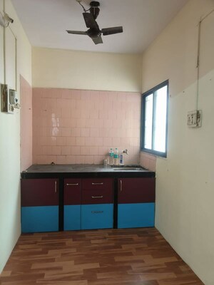 Kitchen in 2 BHK Apartment at Damodar Villa, Kothrud – for Rent