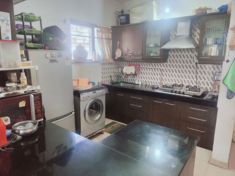 Kitchen, aeropolis-phase-ii 2 Bedroom 1050 Sq.Ft. Apartment In Dhanori Pune 10606905