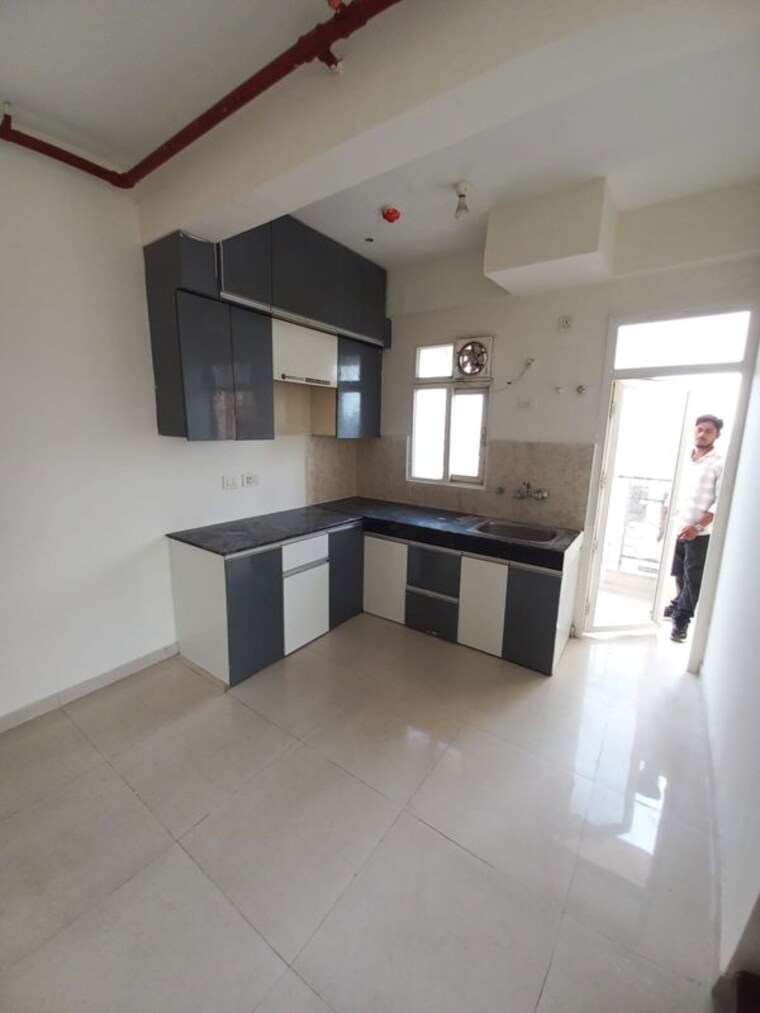 Kitchen, signature-global-the-millennia 2 Bedroom 690 Sq.Ft. Apartment In Sector 37d Gurgaon 10606938
