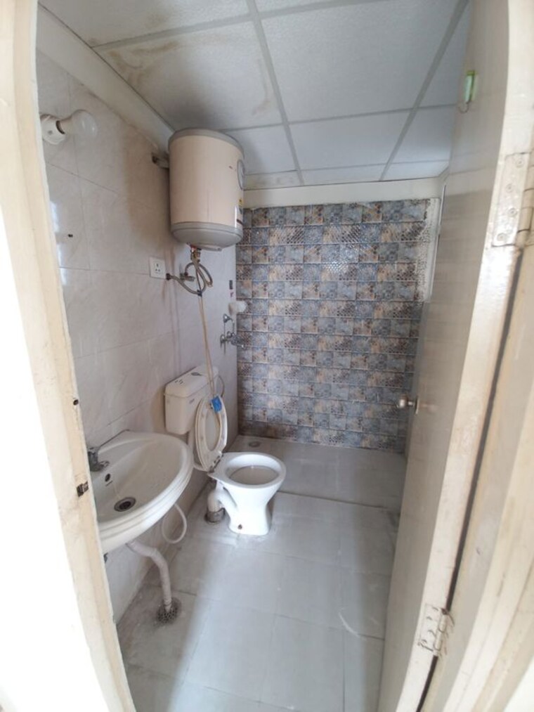 Bathroom, signature-global-the-millennia 2 Bedroom 690 Sq.Ft. Apartment In Sector 37d Gurgaon 10606938