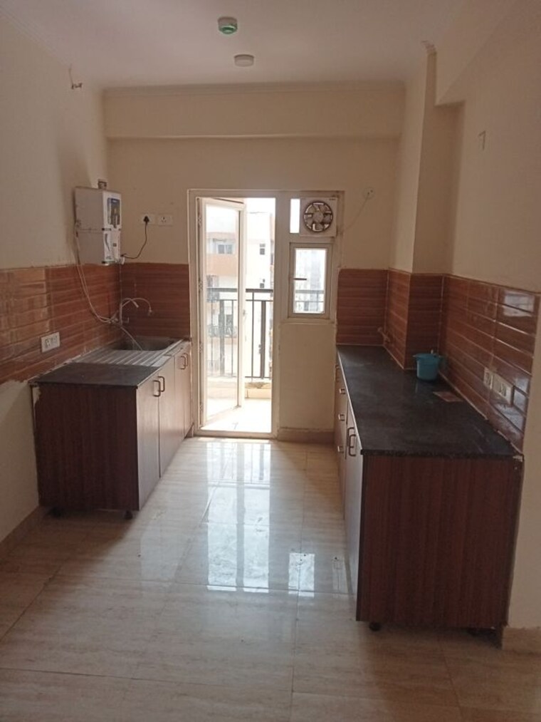 Kitchen, amrapali-terrace-homes 3.5 Bedroom 1600 Sq.Ft. Apartment In Tech Zone 4 Greater Noida Greater Noida 10606978