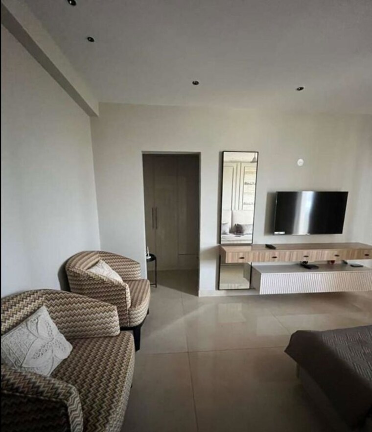 Living Room, maya-green-lotus-saksham 3 Bedroom 1555 Sq.Ft. Apartment In International Airport Road Zirakpur 10607003